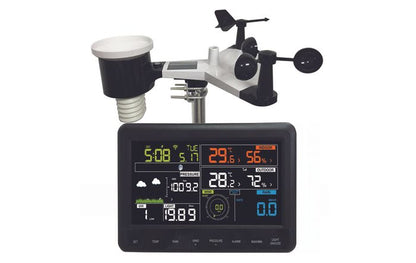 Outdoor weather sensor array positioned above its colour display console
